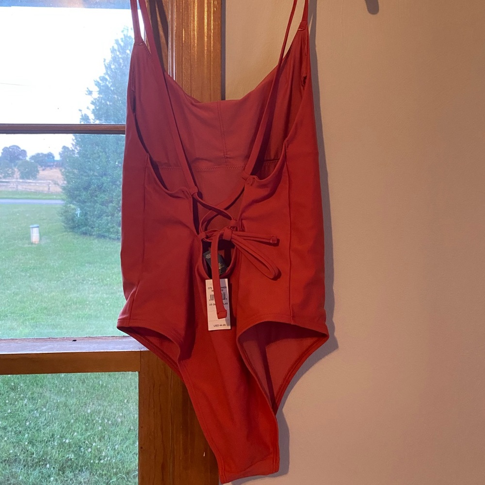 Cute swimsuit with super cute back ! New with tags !